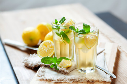 Refreshing summer drink with lemon stock photo containing water and beverage