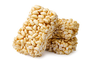 Puffed rice bar close-up on a white