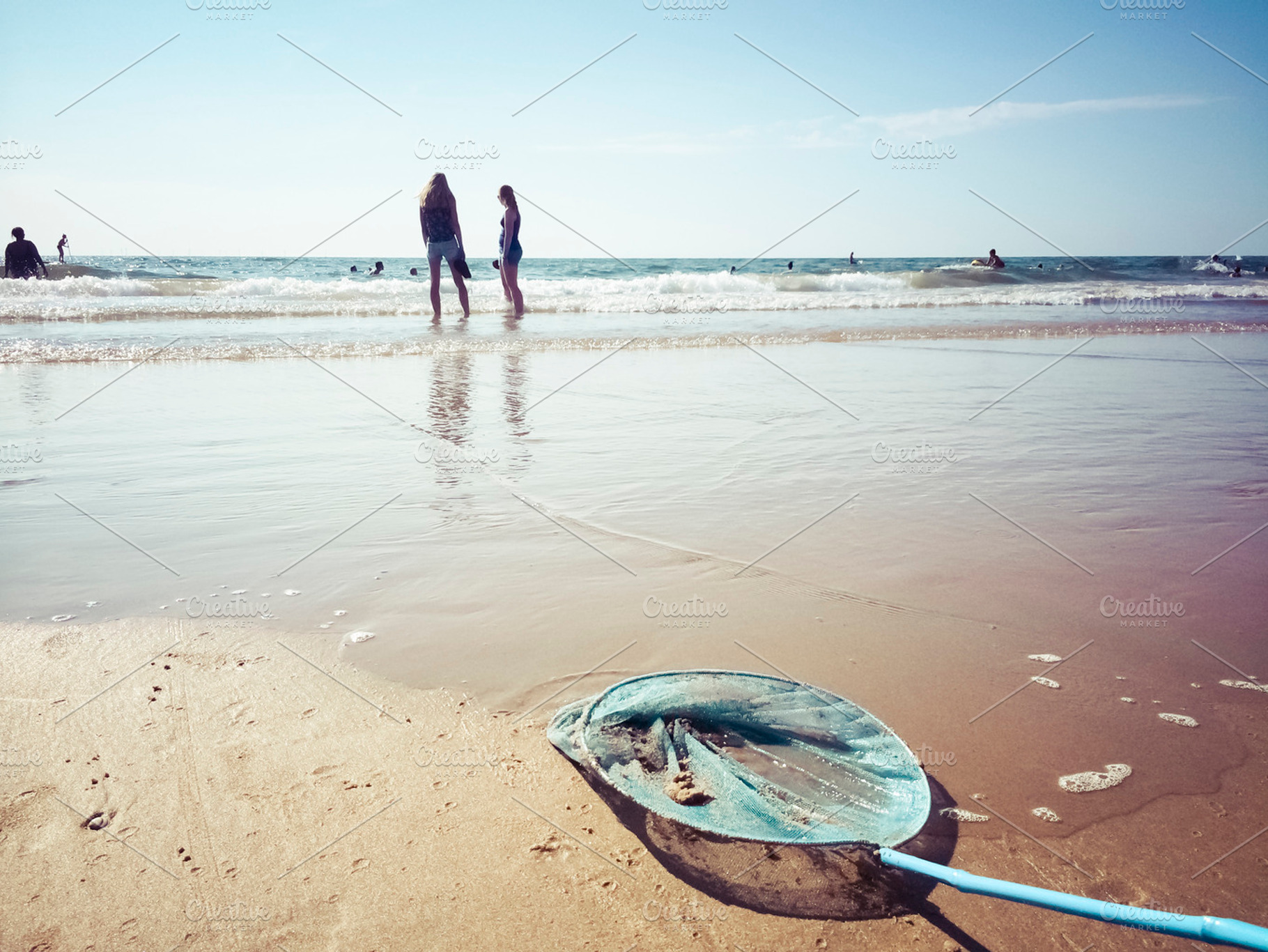 On the beach stock photo containing beach and sand