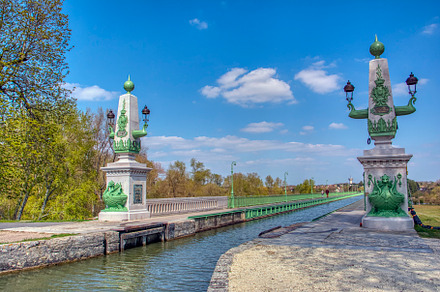 Historic bridge for boats over the river Loire in Centre Val de Loire, France, an Architecture Photo by CreativePhotoSpain