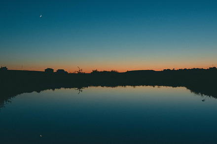 The last light at sunset lake, a Nature Photo by Pro.Motion