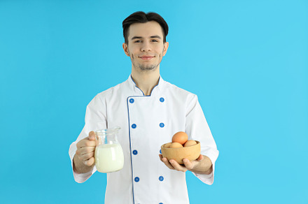 Concept of profession, young attractive male chef, a Person Photo by AtlasStudio PRO
