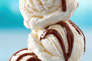 Stacked ice cream scoops with chocolate drizzle, a Food & Drink Photo by AlyaAnd