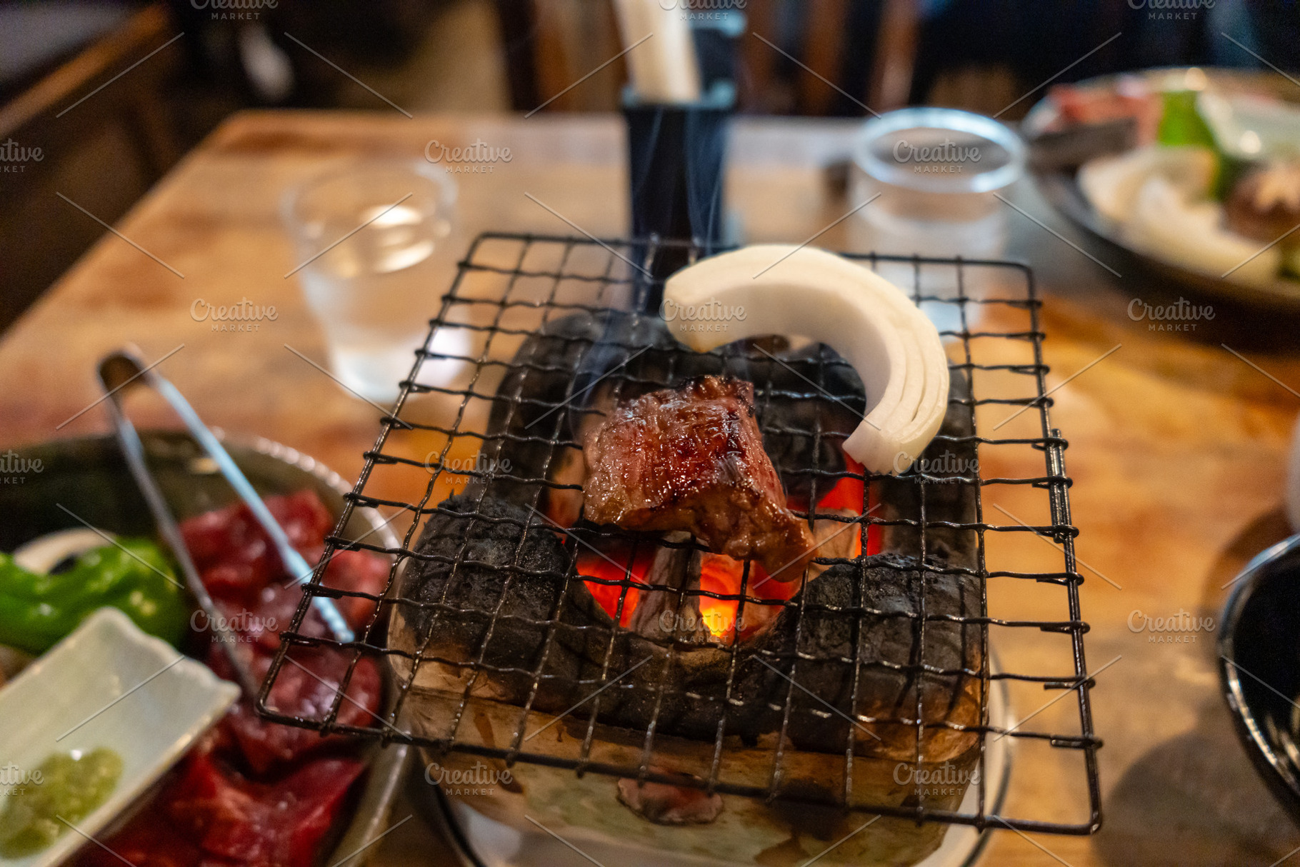 Grilled Hida Wagyu beef on traditional fire grill in Takayama, a Food & Drink Photo by GoodGoods