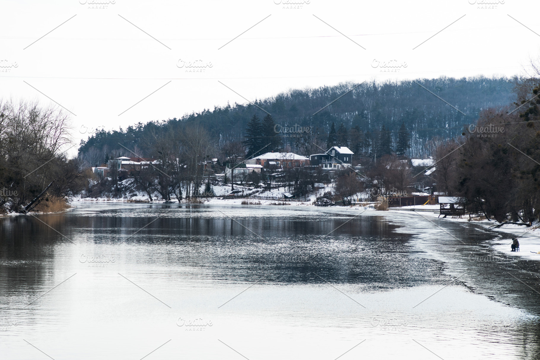 Houses in winter forest near river f, a Nature Photo by FineArtStudio