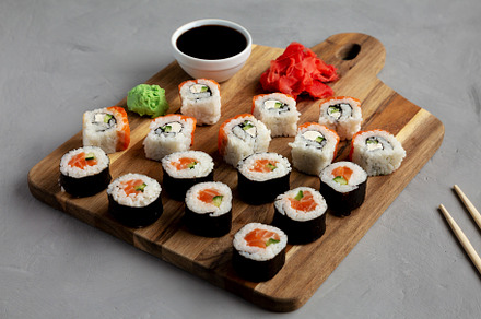 Homemade Sushi Platter with Wasabi and Soy Sauce on a Board, sid, a Food & Drink Photo by LiudmylaChuhunova