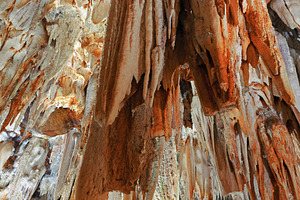 Reddish and white stalactites in an, a Nature Photo by Perpis