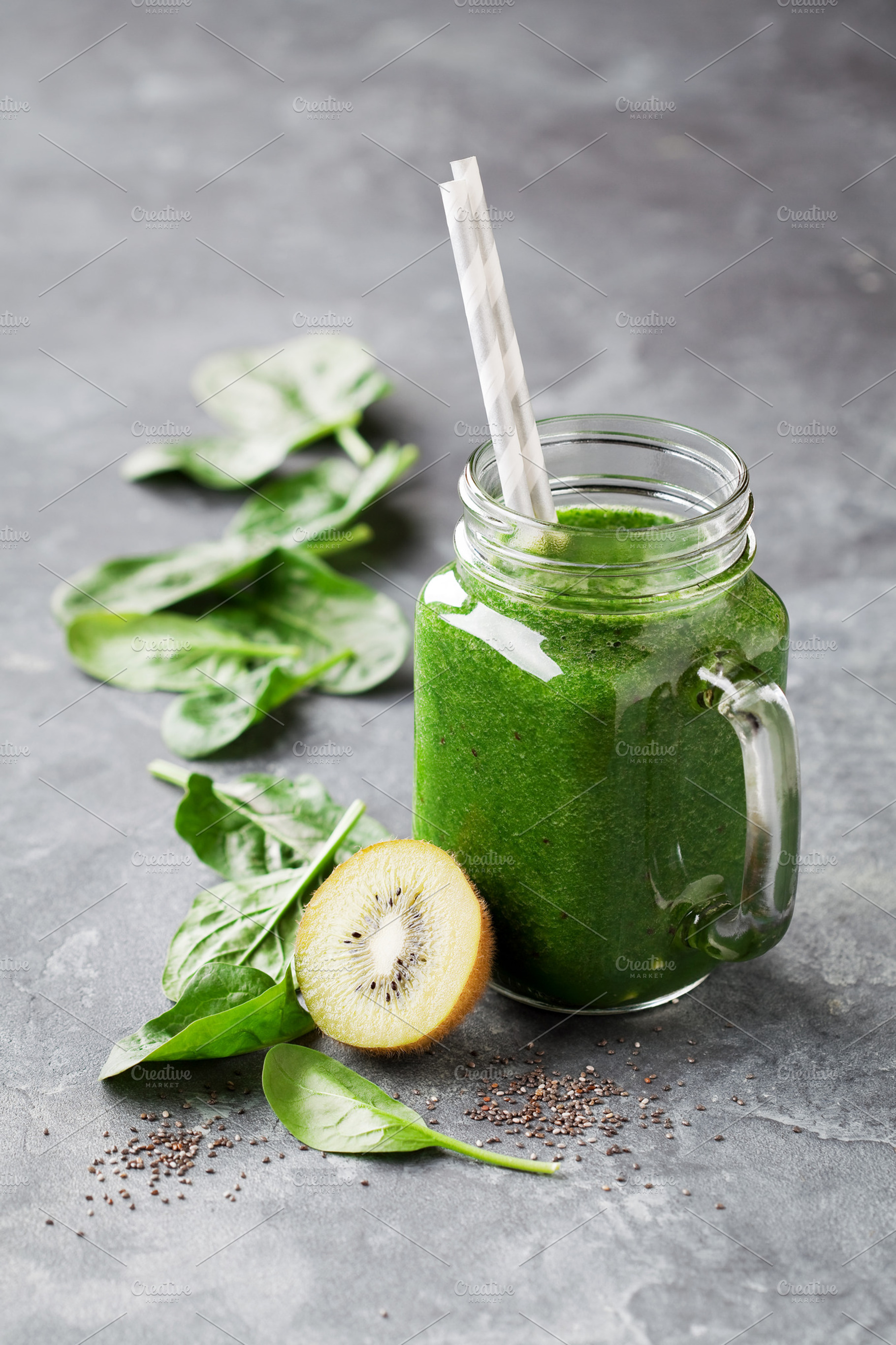 Healthy green smoothie with spinach, kiwi and chia seeds, a Food & Drink Photo by Y. A. Photo