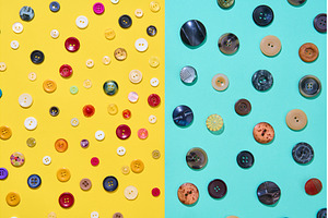 Assorted sewing buttons on yellow, a Background Photo by Gladkov photography
