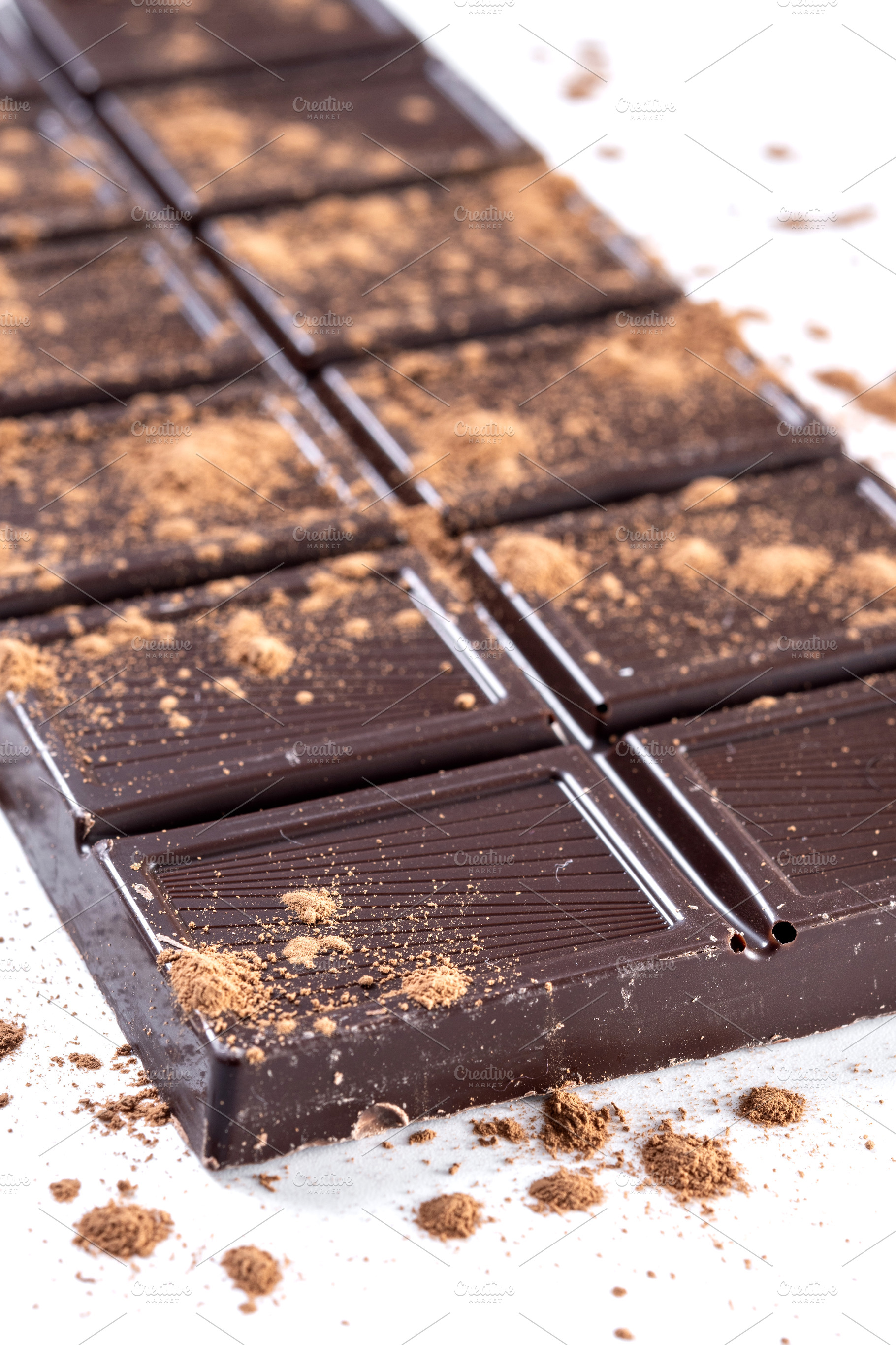 Milk chocolate bar with cocoa powder, a Food & Drink Photo by etorres69