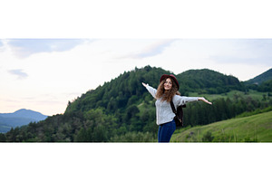 Young tourist woman traveller with, a Person Photo by HalfPoint