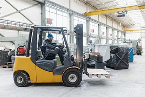 Happy mature man fork lift truck, an Industrial Photo by HalfPoint