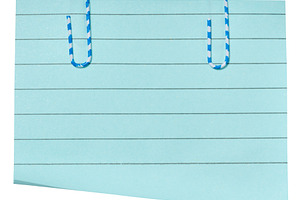 A rectangular sheet of light blue lined paper with two blue and, a Background Photo by ndanko