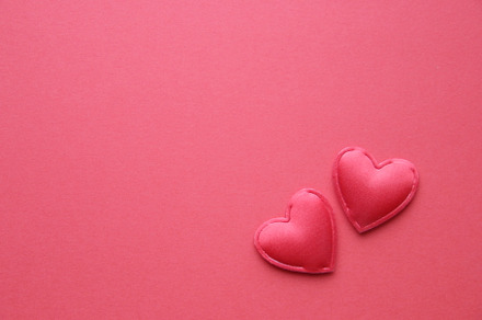 Birthday background. Red hearts.