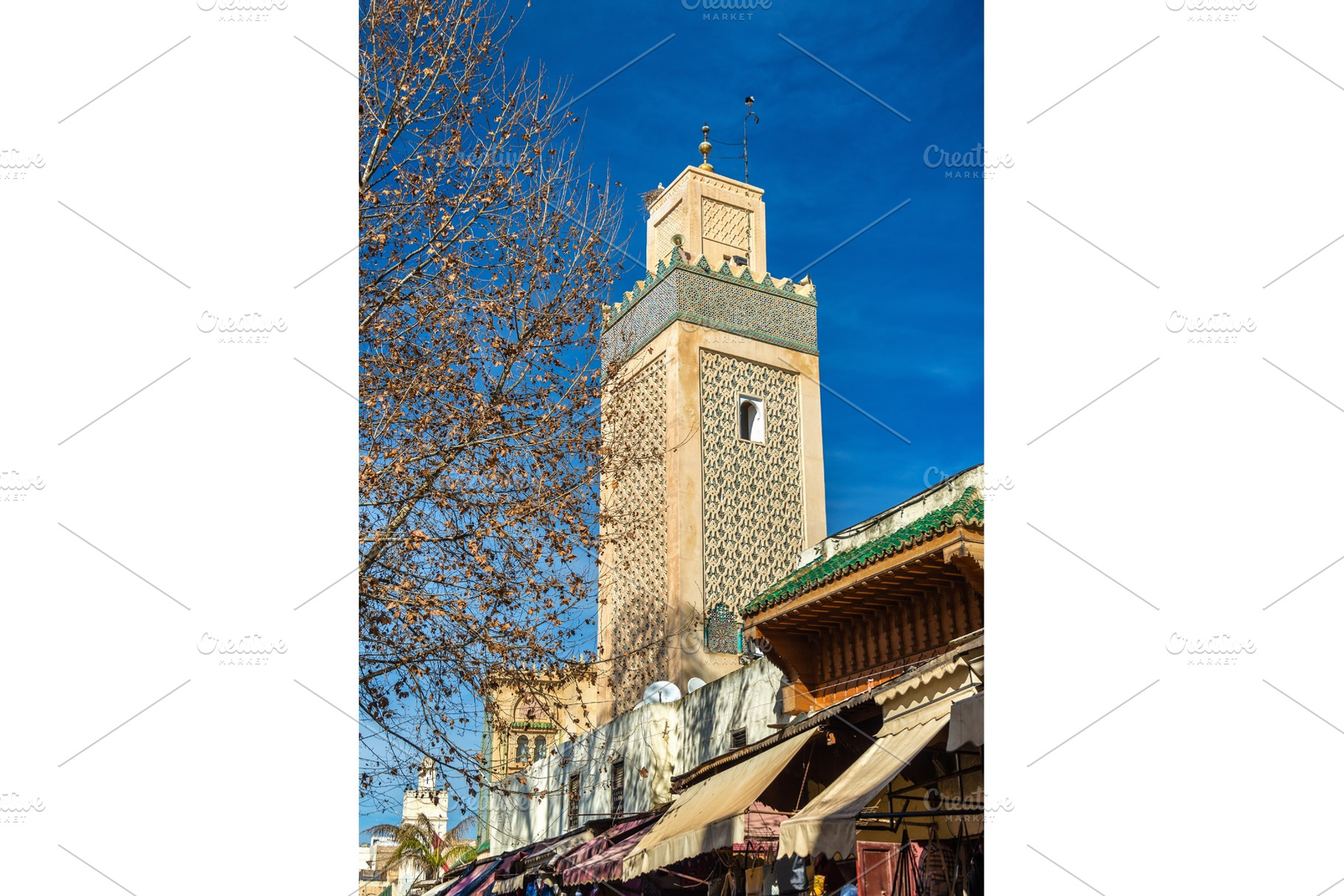 Minaret in fes jdid one of the three parts of fes morocco featuring fes, an Architecture Photo by Leonid Andronov