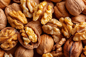 Background of ripe and tasty walnuts, a Food & Drink Photo by AlyaAnd