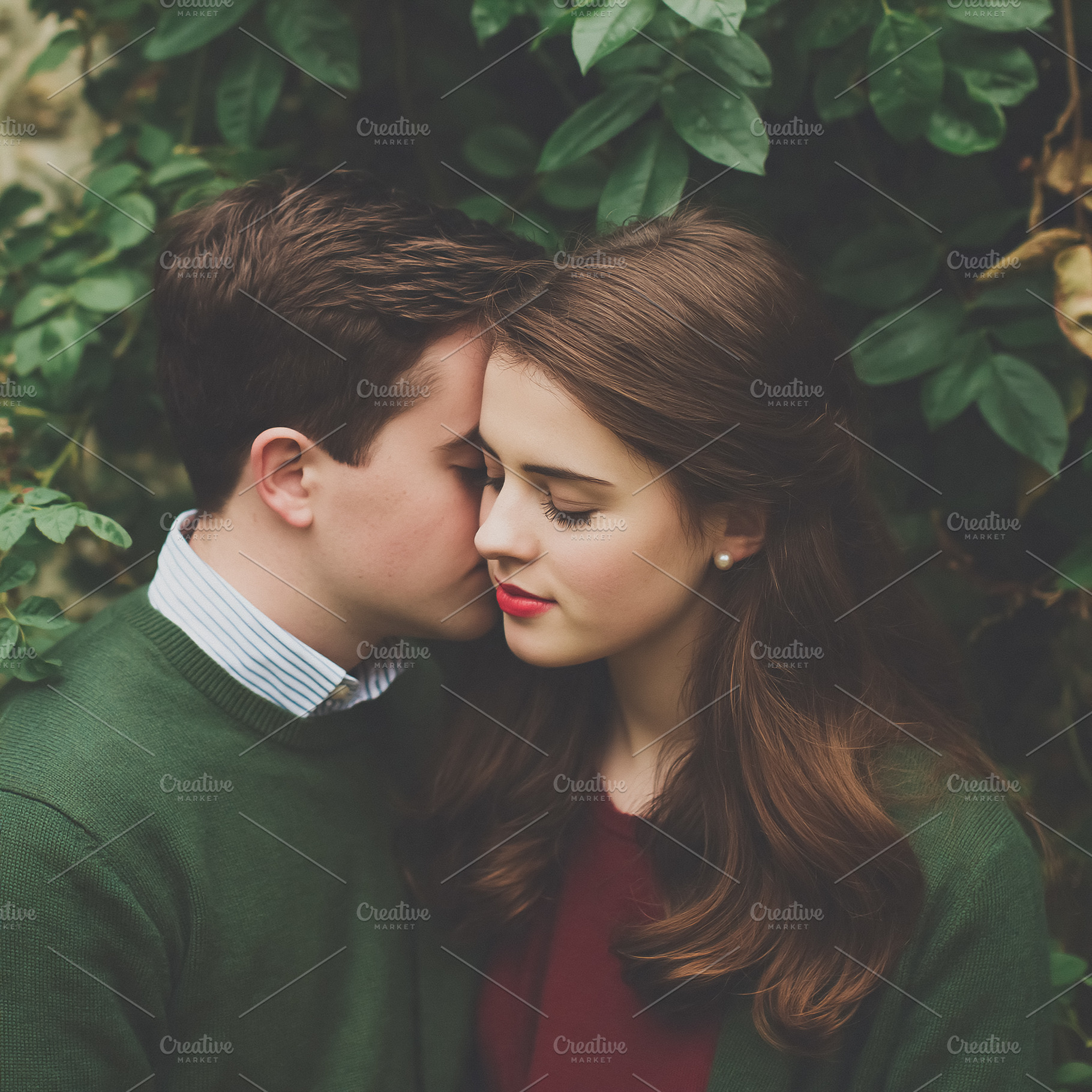 Young couple sharing an intimate moment, man expressing tenderne, a Person Photo by Studio ANNA
