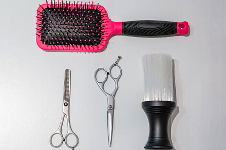 Hairdressing equipment over a white wooden background stock photo containing, a Beauty & Fashion Photo by davidpereiras