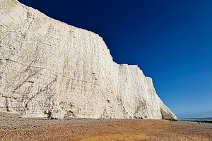 White chalk cliffs at Seven Sisters in East Sussex on a clear blue sky day, a Nature Photo by AS photostudio