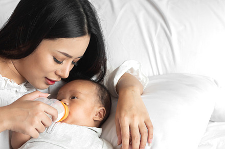 Portrait of enjoy happy love family asian mother playing with ad, a Person Photo by Art_Photo