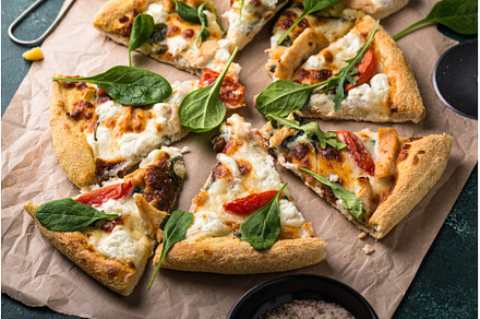 Italian pizza with feta cheese, a Food & Drink Photo by Yulia Furman