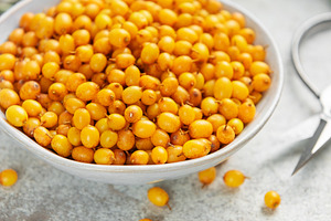 Sea buckthorn berries in bowl ready for harvest, a Food & Drink Photo by Olena Rudo