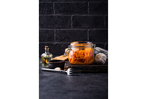 Spicy korean carrot salad in jar, a Food & Drink Photo by Yulia Furman
