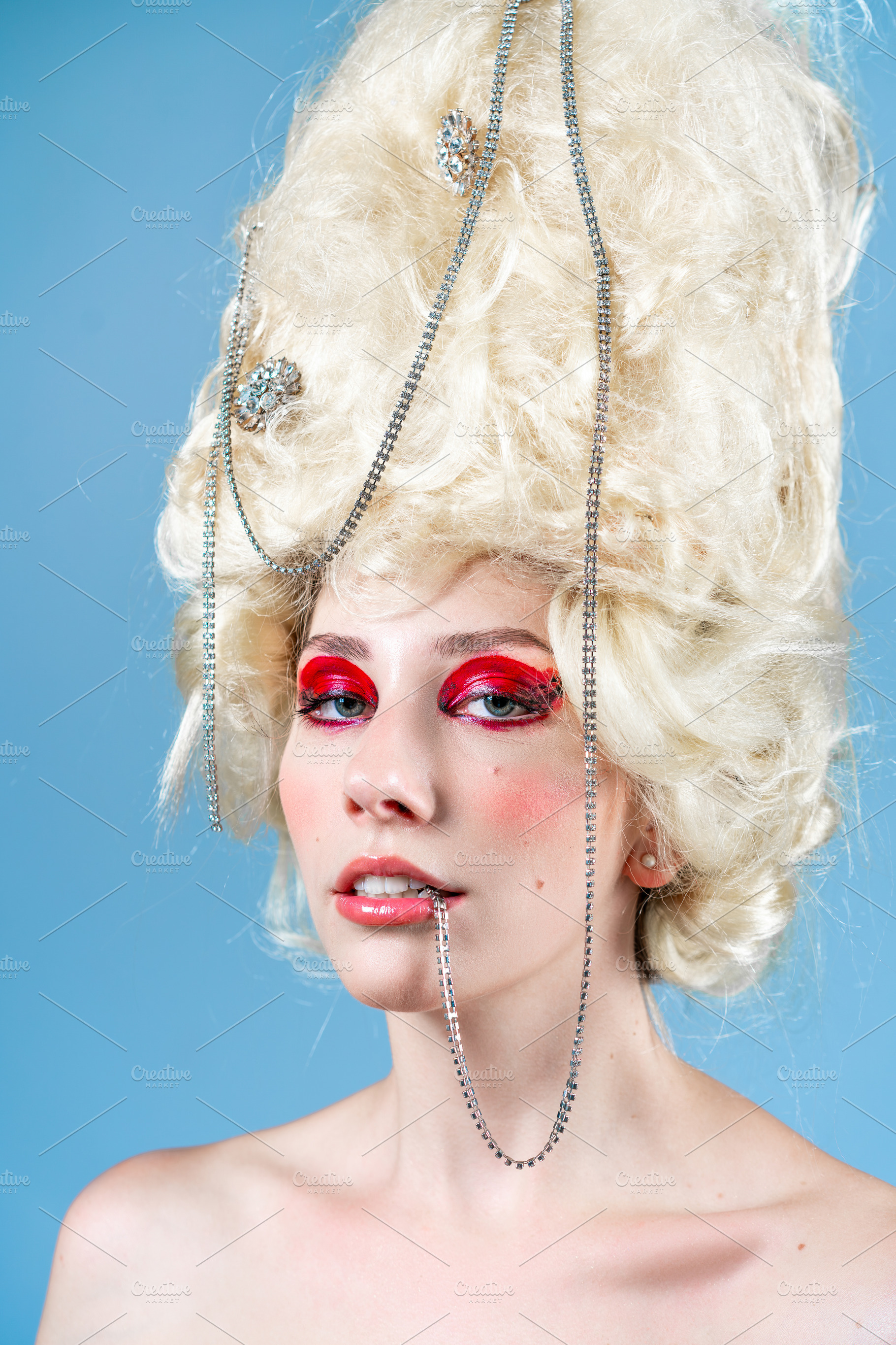 Glamourous topless female model in huge blond wig with accessories, a Person Photo by andreonegin market