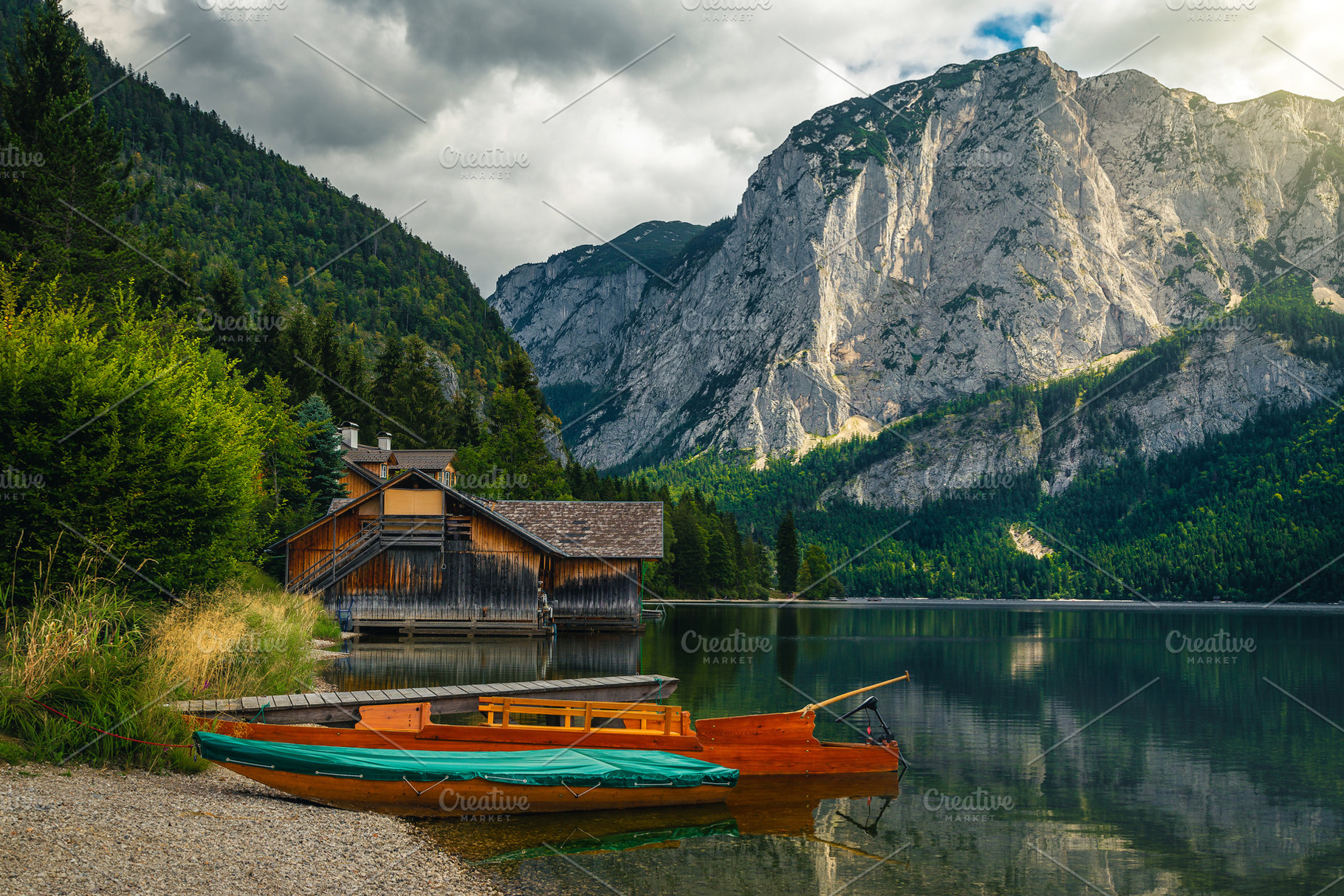 Moored boats on the lake shore, a Nature Photo by Alpine Dreams