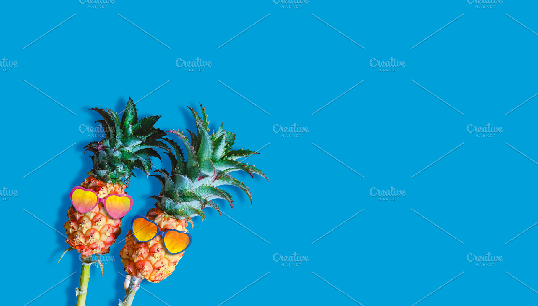 Couple pineapples with sunglasses, a Nature Photo by ArtBackground