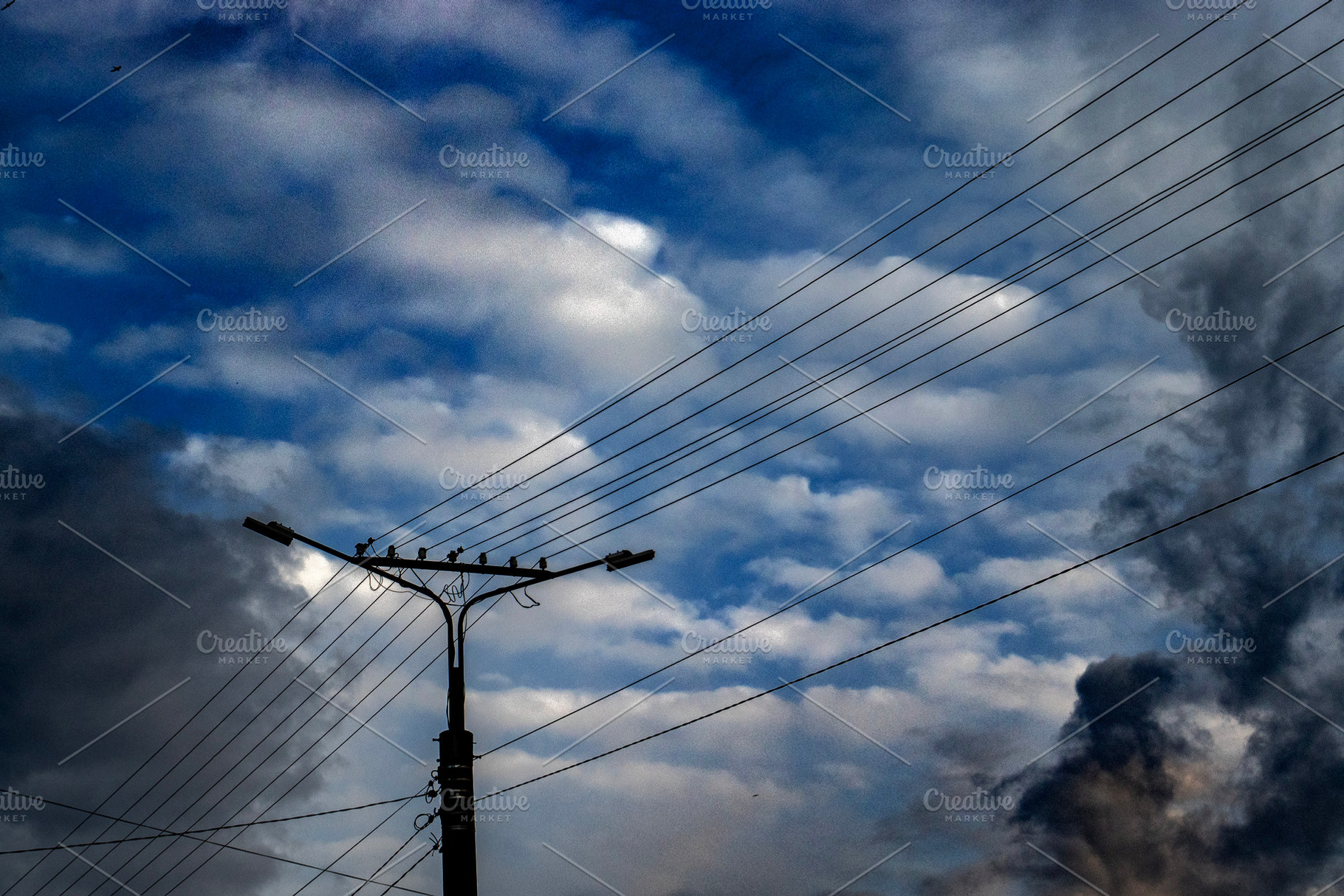 Wires and blue sky in clouds., a Technology Photo by Schreibikus