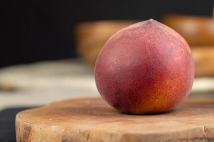 ripe delicious and fresh peaches of a red hue, a Photo by MyPhotos