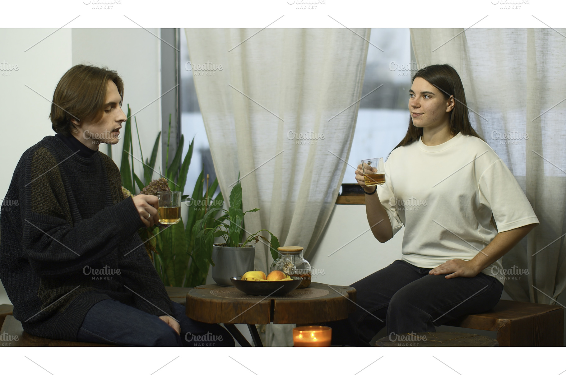 Students communicate and drink tea, a Person Photo by Media Whale Stock