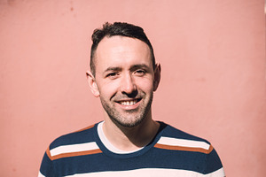 Adult man portrait containing man, smiling, and smile