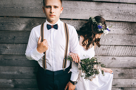 Beautiful couple with flowers containing outdoor, hands, and natural