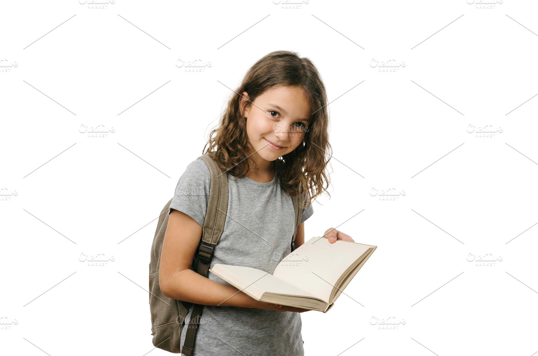 Girl Reading a School Book, a School & Education Photo by CREATIVEDEF