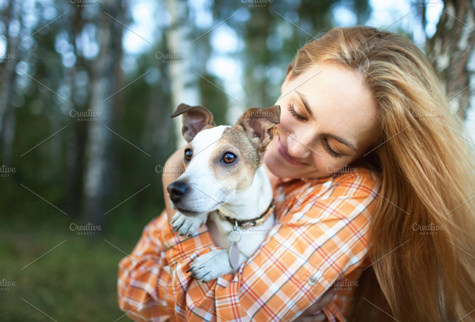 Young girl hugging her dog, a Person Photo by AlinLyre