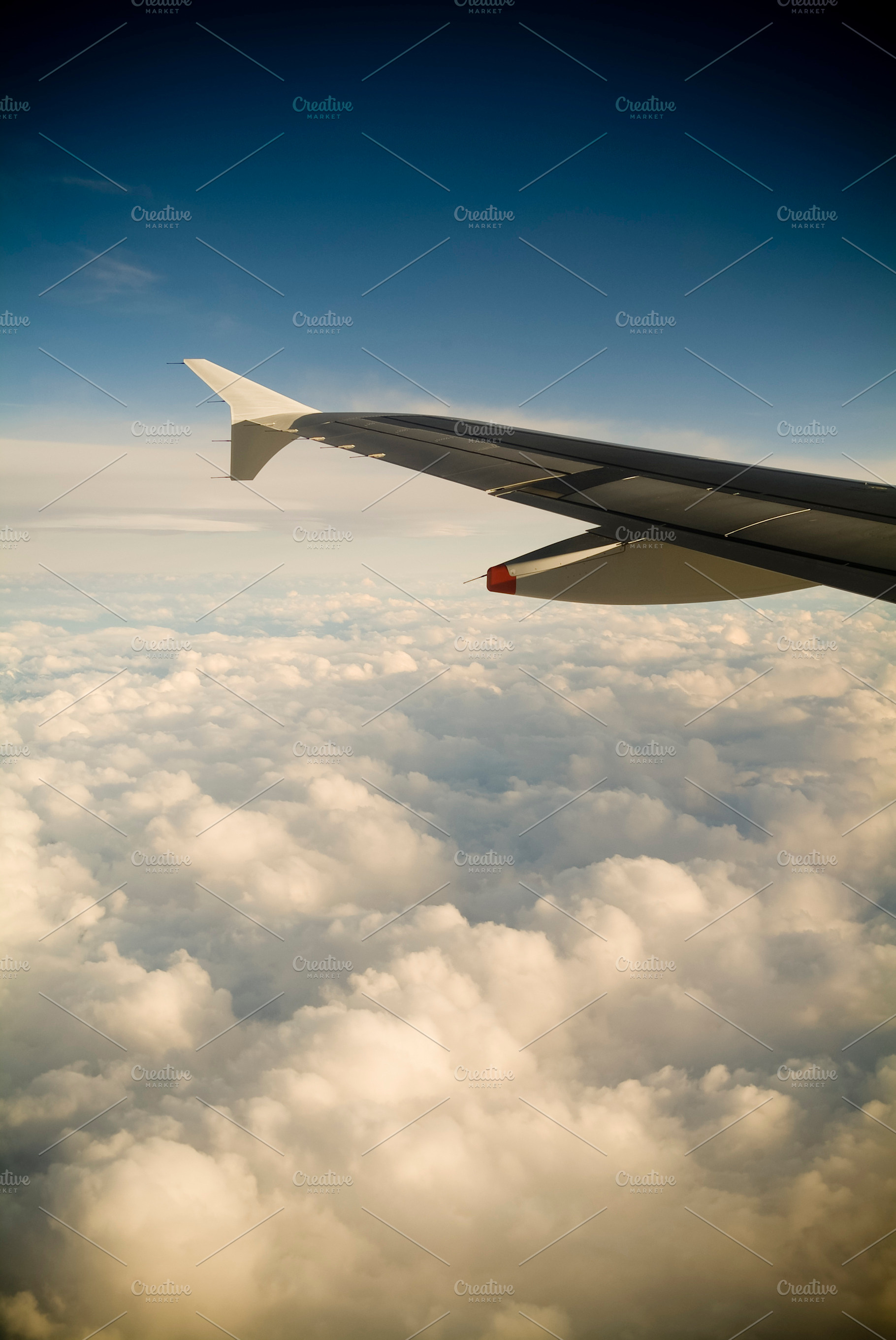 Airplane Wing In Flight, a Transportation Photo by THP Creative