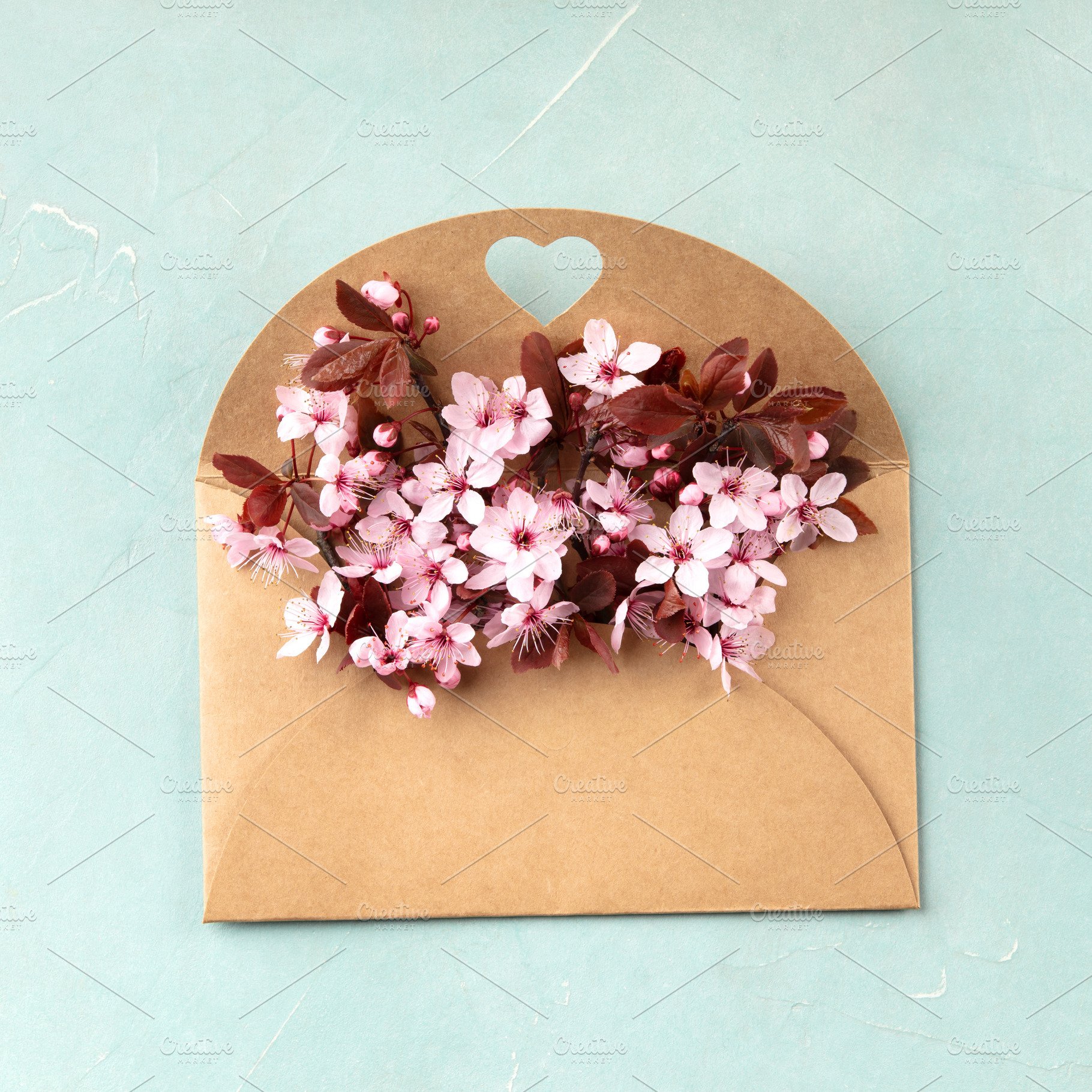Spring Blossoms in Kraft Envelope with Heart Cutout, a Holiday Photo by Natalia Klenova's Shop