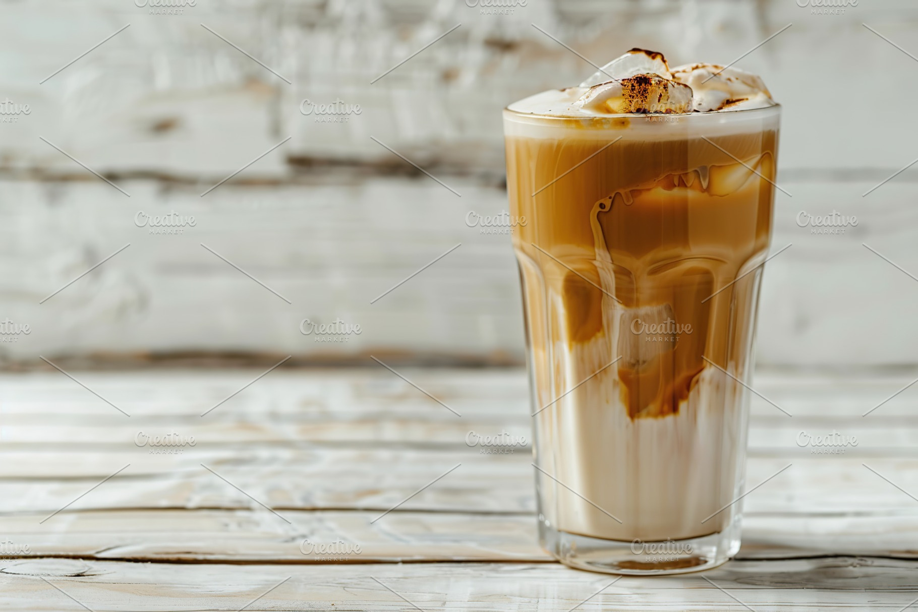 Glass of iced coffee on wooden table, a Food & Drink Photo by AlyaAnd