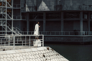 Woman on Modern Waterfront, a Person Photo by SkyNext