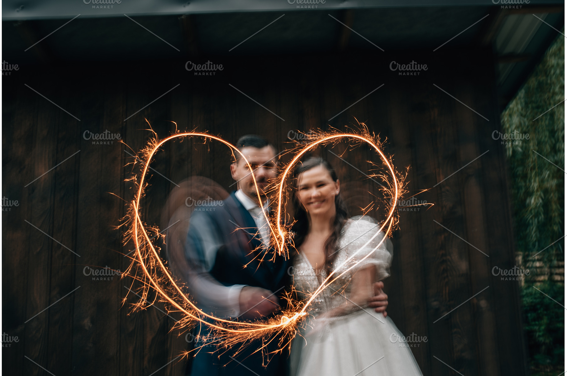 Bride and groom with sparklers, a Person Photo by HalfPoint