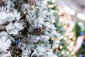 White Christmas tree and gold bokeh 