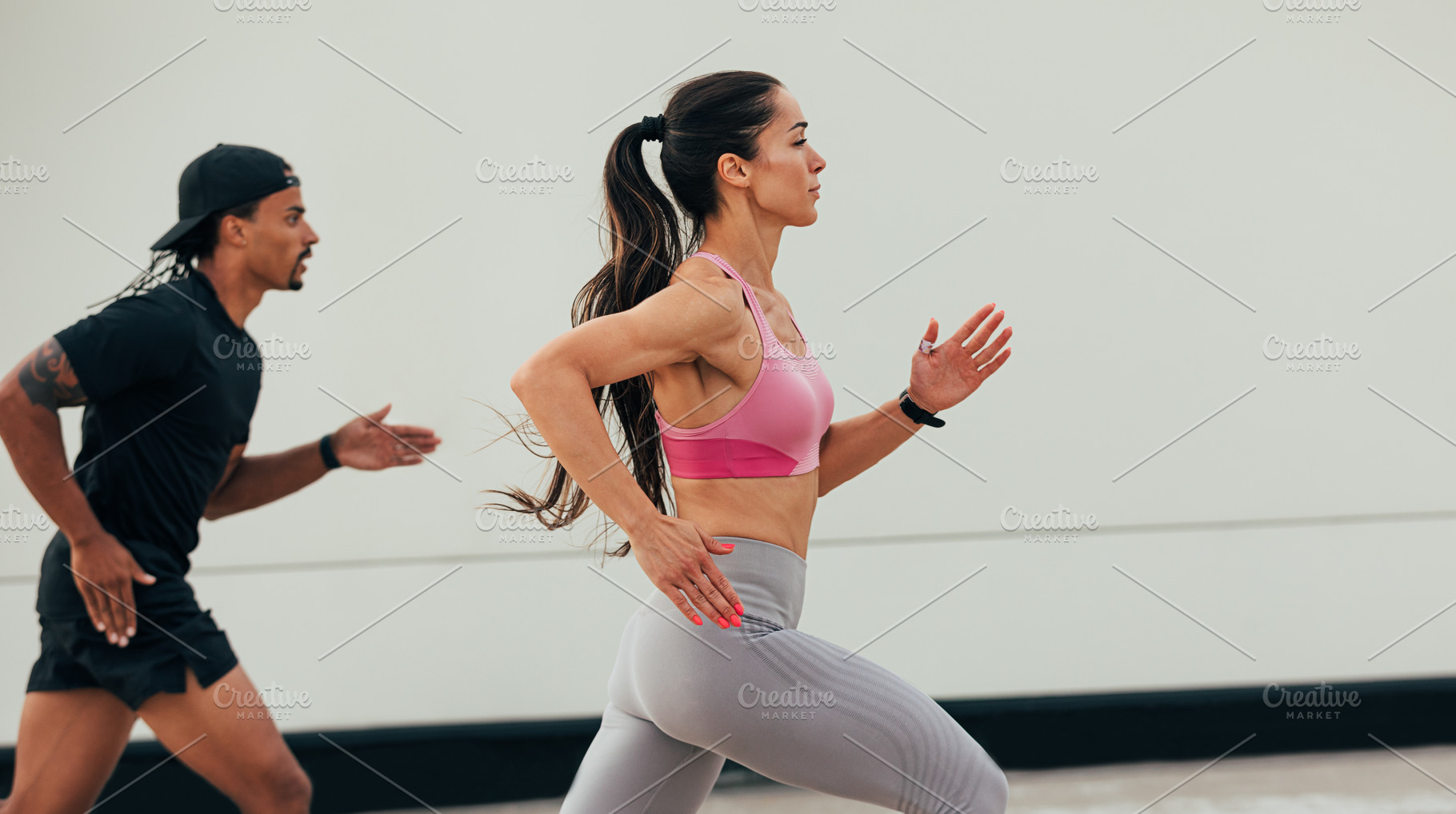 Young female and male running, a Sports & Recreation Photo by Artem Varnitsin