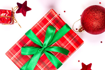 Christmas composition. Red gift boxes with green ribbon at white, a Holiday Photo by vimart