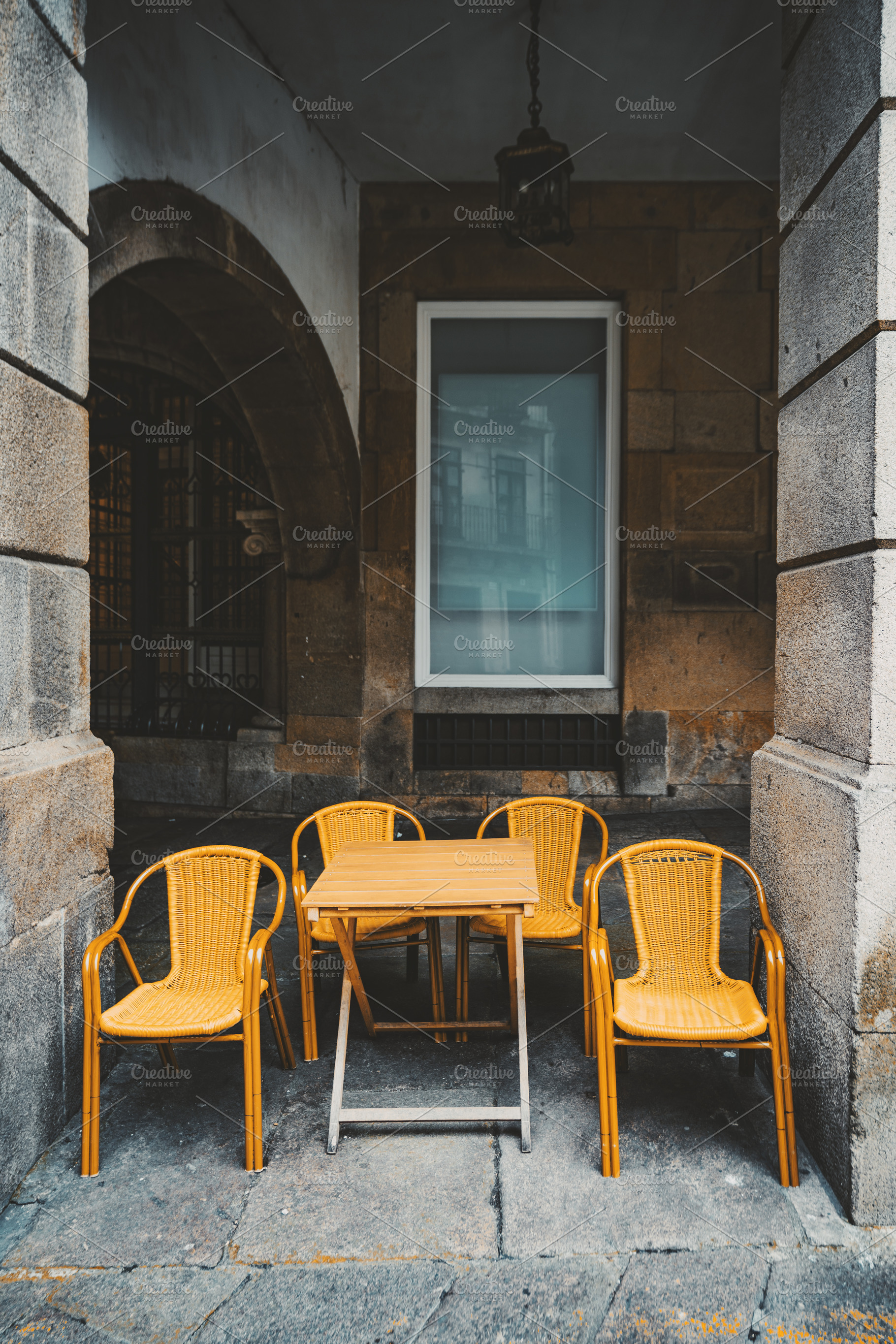 Empty cafe table with yellow chairs, an Architecture Photo by SkyNext