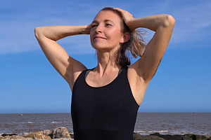 Mature woman at outdoors with calm face, a Person Photo by DanFLCreativo