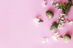 Easter flat lay. Stylish easter eggs and cherry flowers on pink, a Holiday Photo by Sonjachni