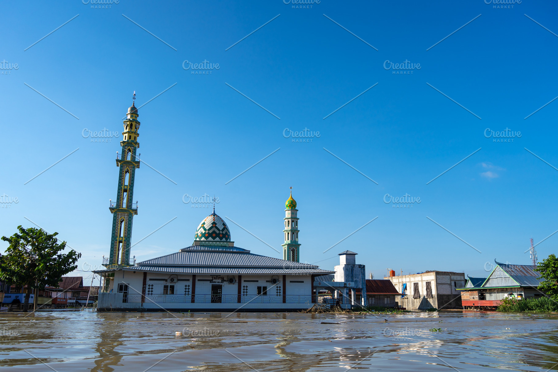 Mosque on Lake Tempe, South Sulawesi, Indonesia at Sunrise, an Architecture Photo by GoodGoods