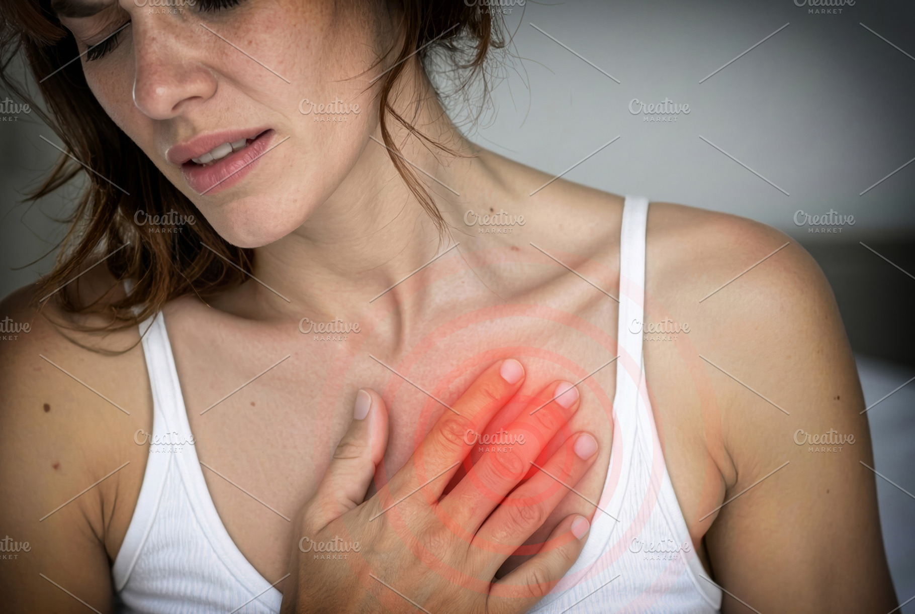 Woman Experiencing Chest Pain, a Health & Medical Photo by Davizro's Market